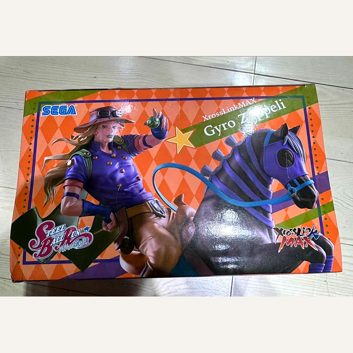 Back panel of the box showing Gyro riding the horse