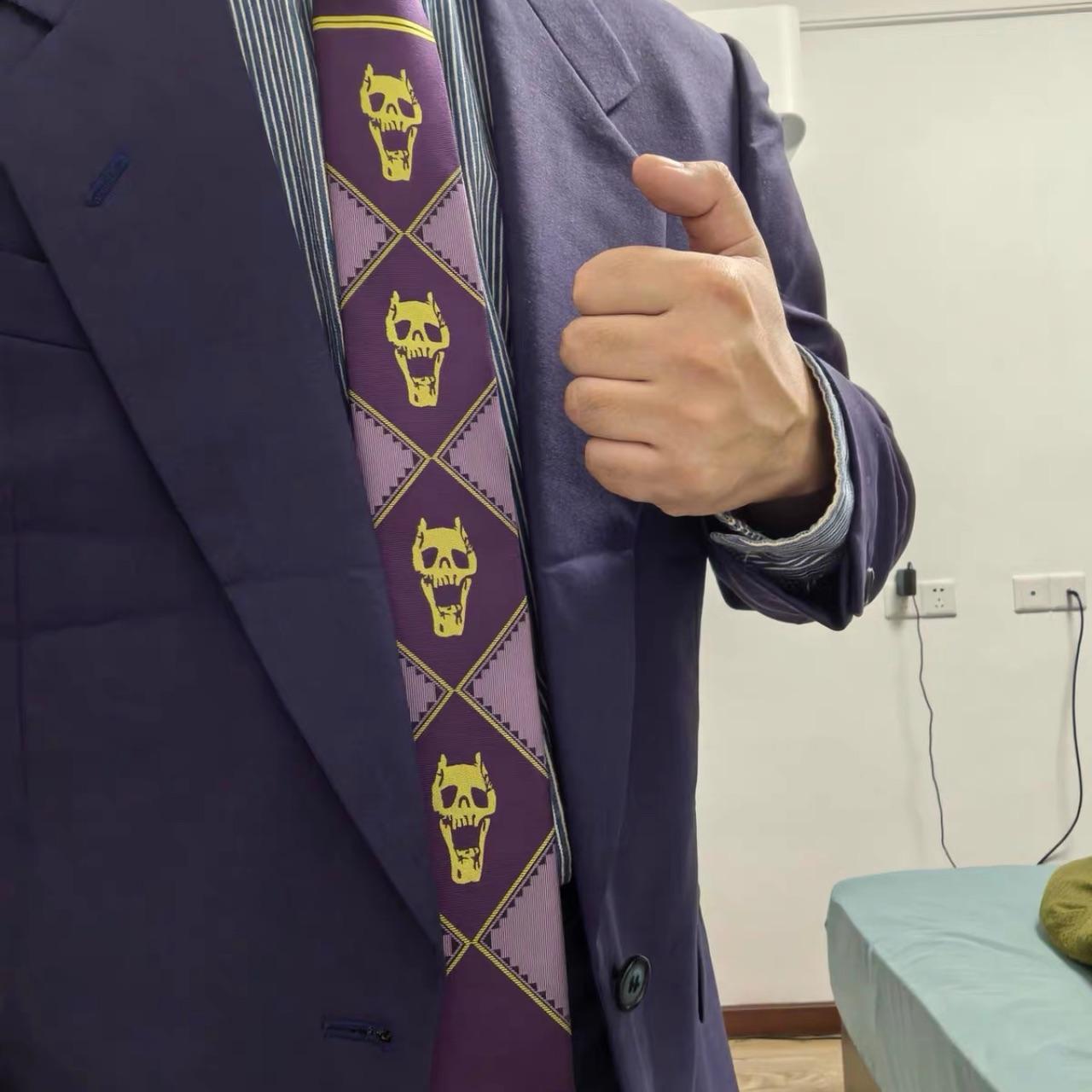 Tie worn with a navy suit, hands-free styling example