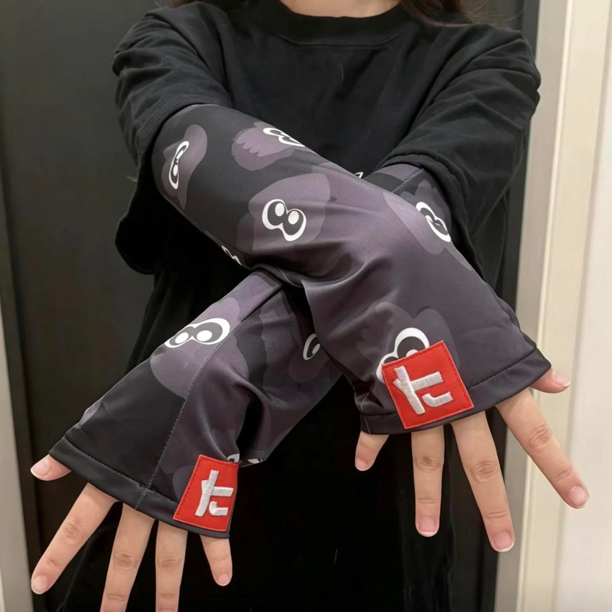 Black Camo Arm Sleeves — worn front view
