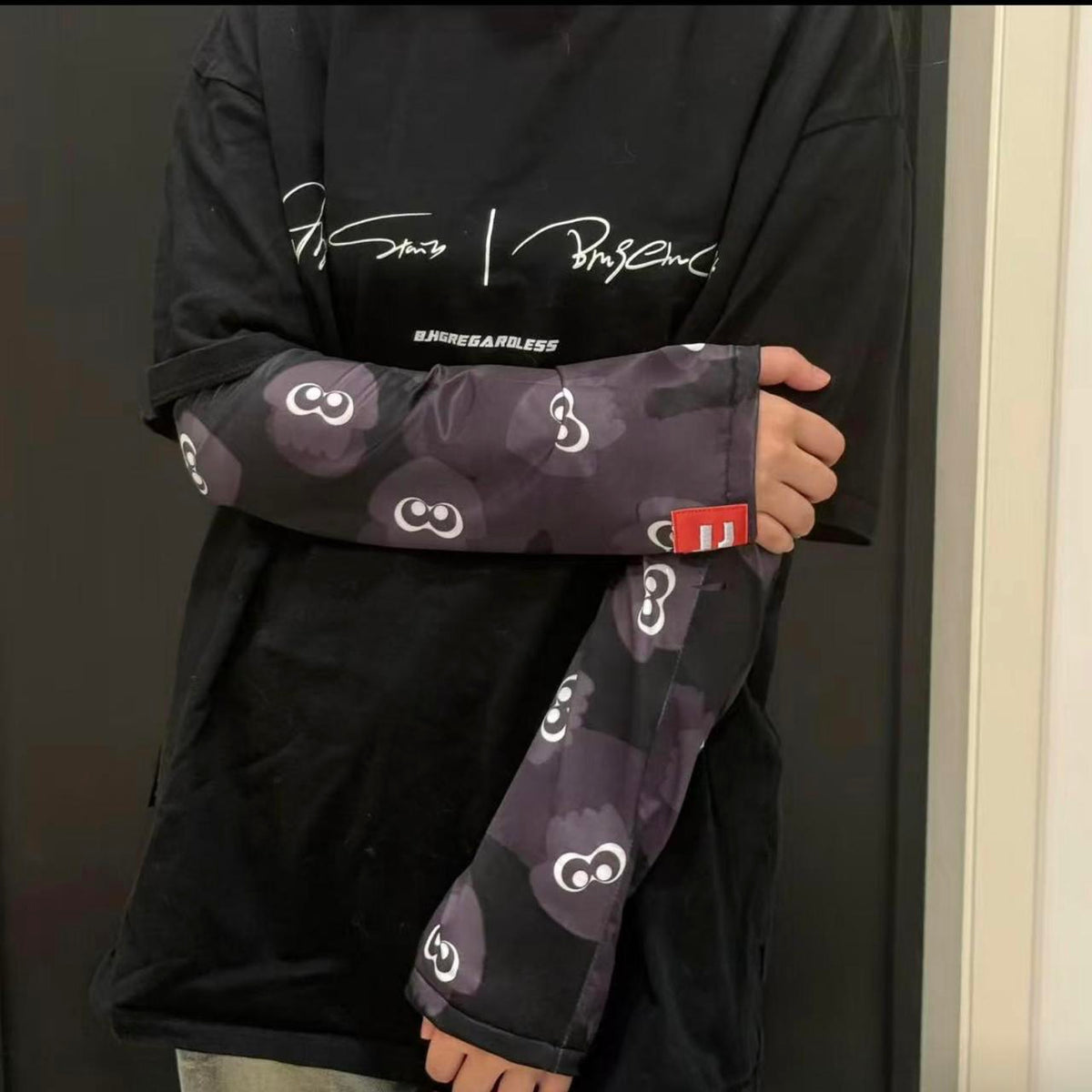 Black Camo Arm Sleeves — worn side view