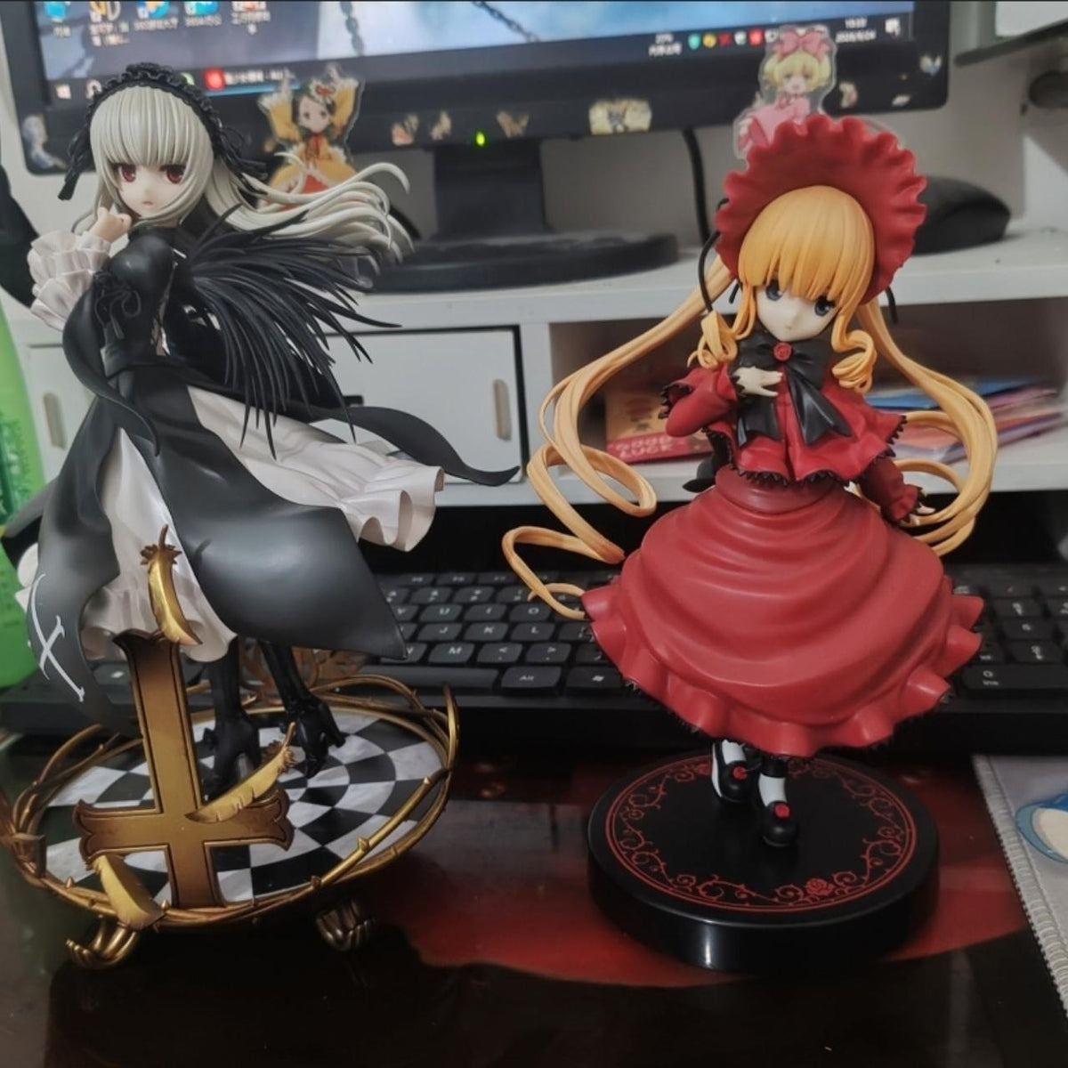 Shinku and Suigintou Rozen Maiden prize figures displayed side by side